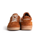 Front and back view of Lanzera Jackal Caramello soccer shoes with suede upper.